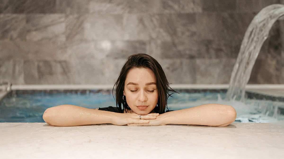 Woman relaxing in pool