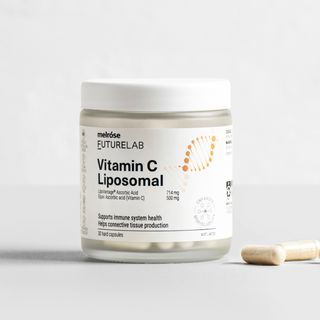 Vitamin C liposomal supplement jar with a capsule on a light gray background