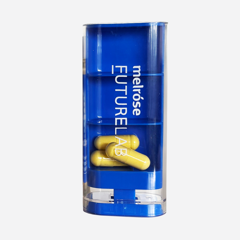 Blue container with yellow capsules on a white background