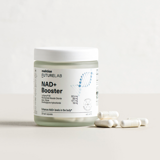 NAD+ booster supplement container with capsules on a light background
